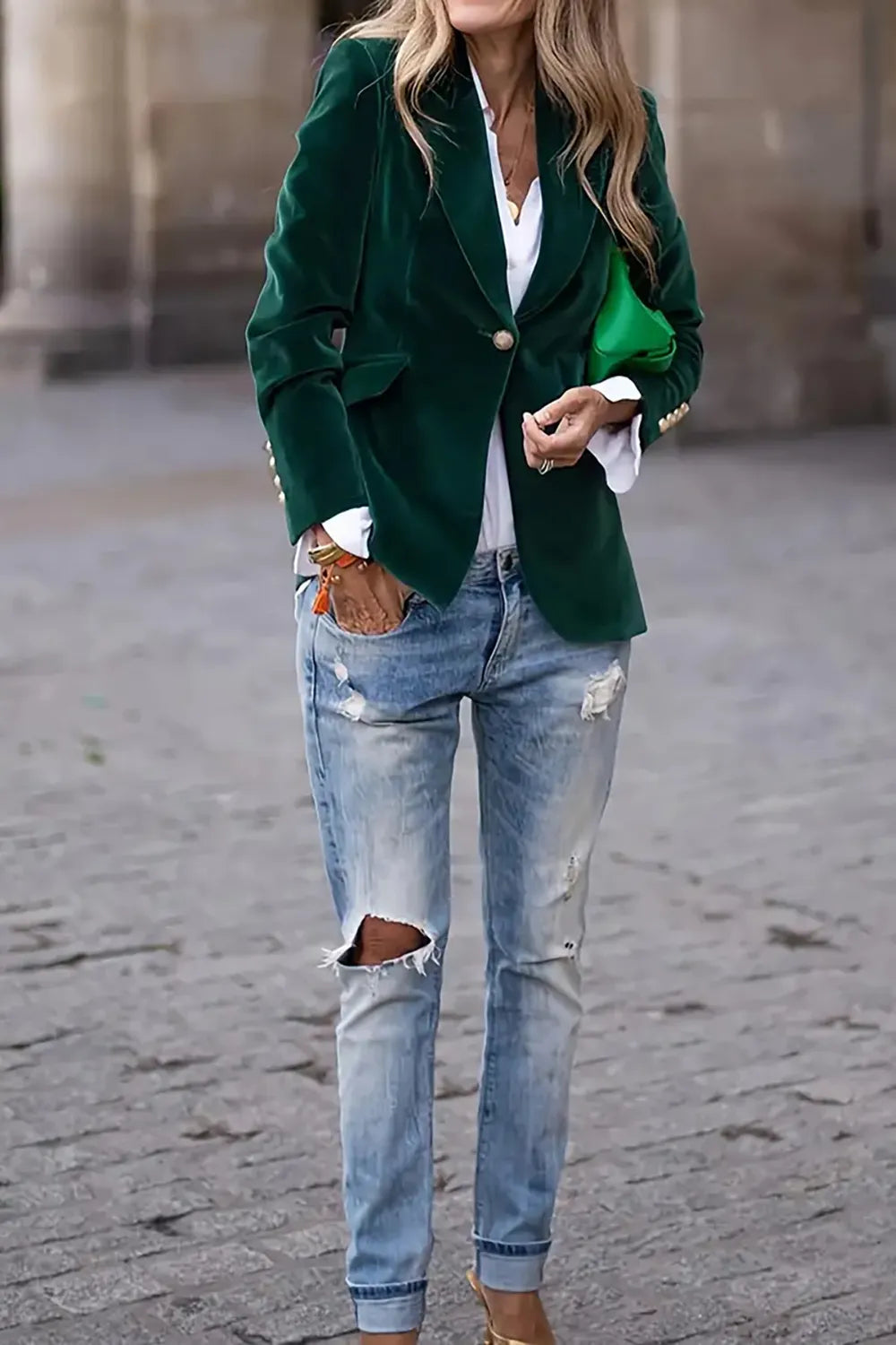 green one button lapel collar long sleeve blazer styled with ripped jeans and white shirt