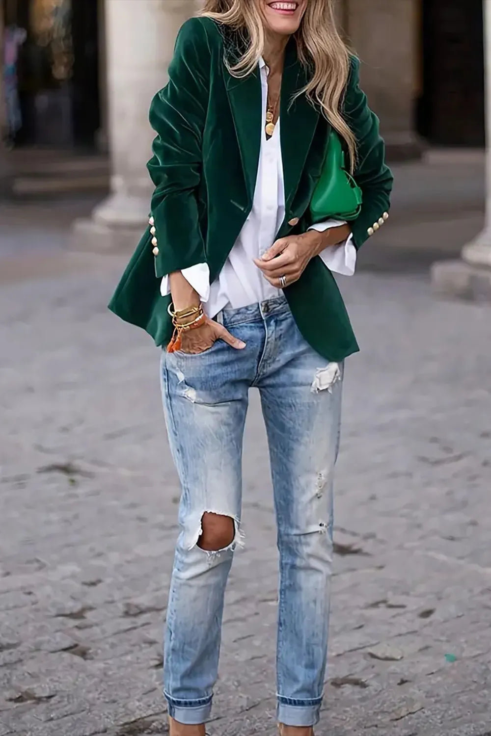 Green one button lapel collar long sleeve blazer with pearl buttons on cuffs, paired with white shirt and ripped jeans
